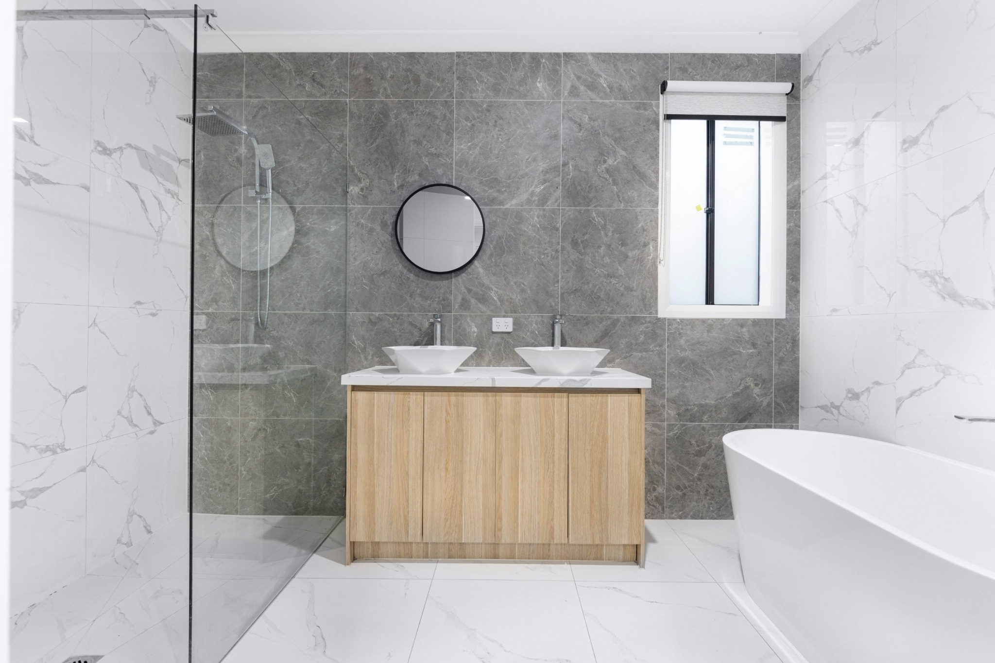 Modern completed bathroom renovation by Dynamic Projecx